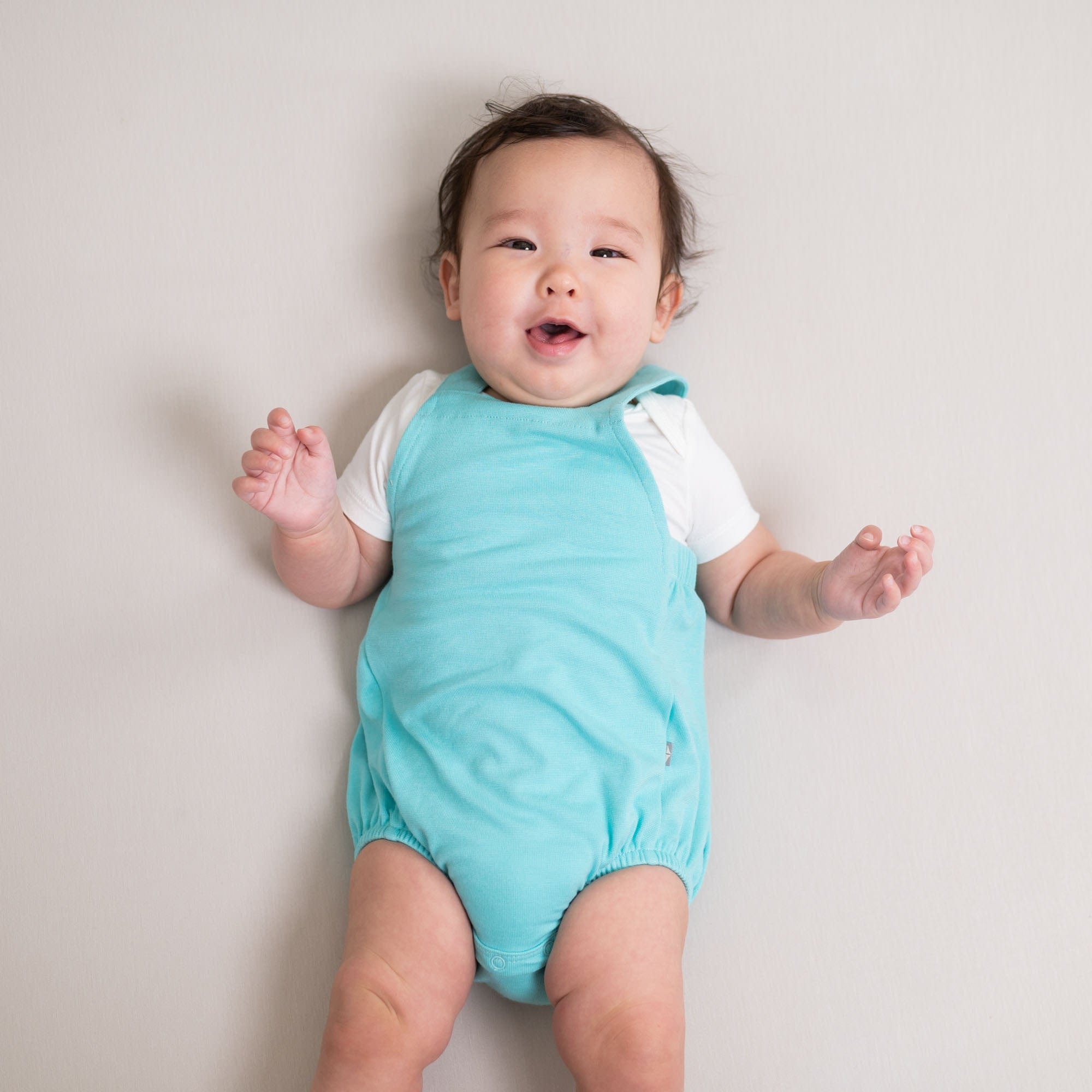 https://www.blossom.baby/wp-content/uploads/2023/07/kyte-baby-bubble-overall-bamboo-jersey-bubble-overall-in-robin-32097014743151_3000x.jpg