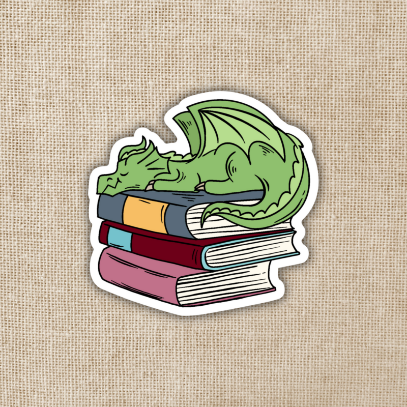 Wildly Enough Dragon Sleeping on Book Pile Sticker